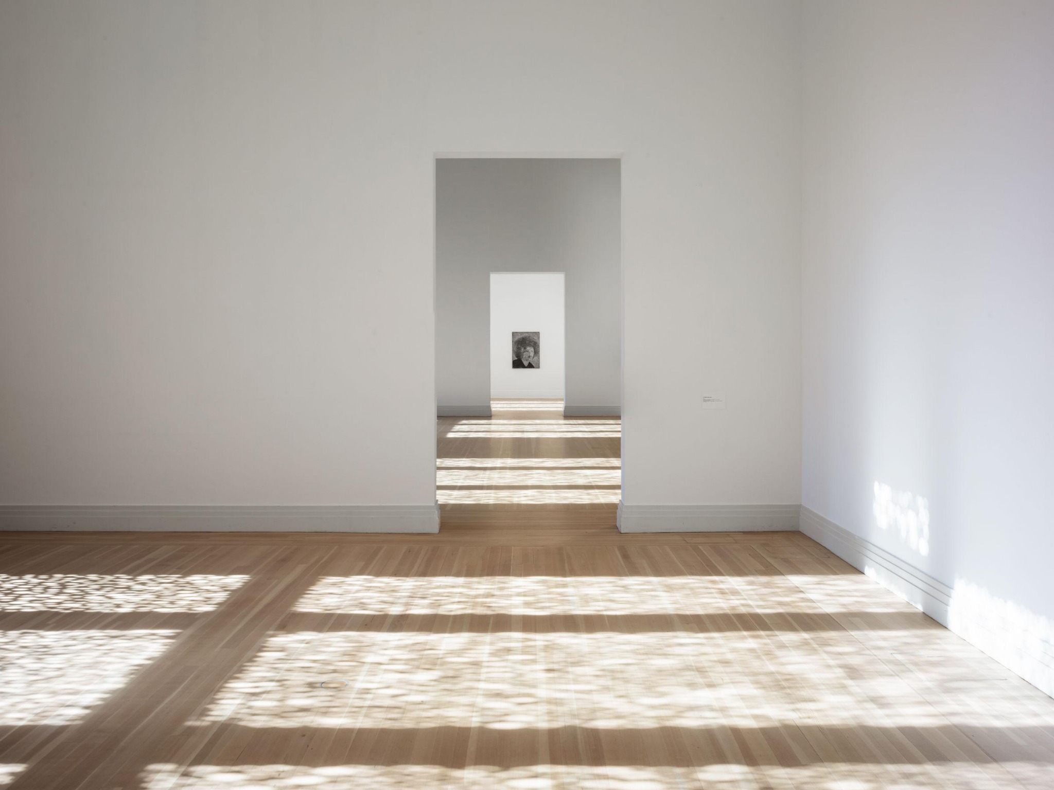 An open, sunlit gallery space with room to pause and reflect